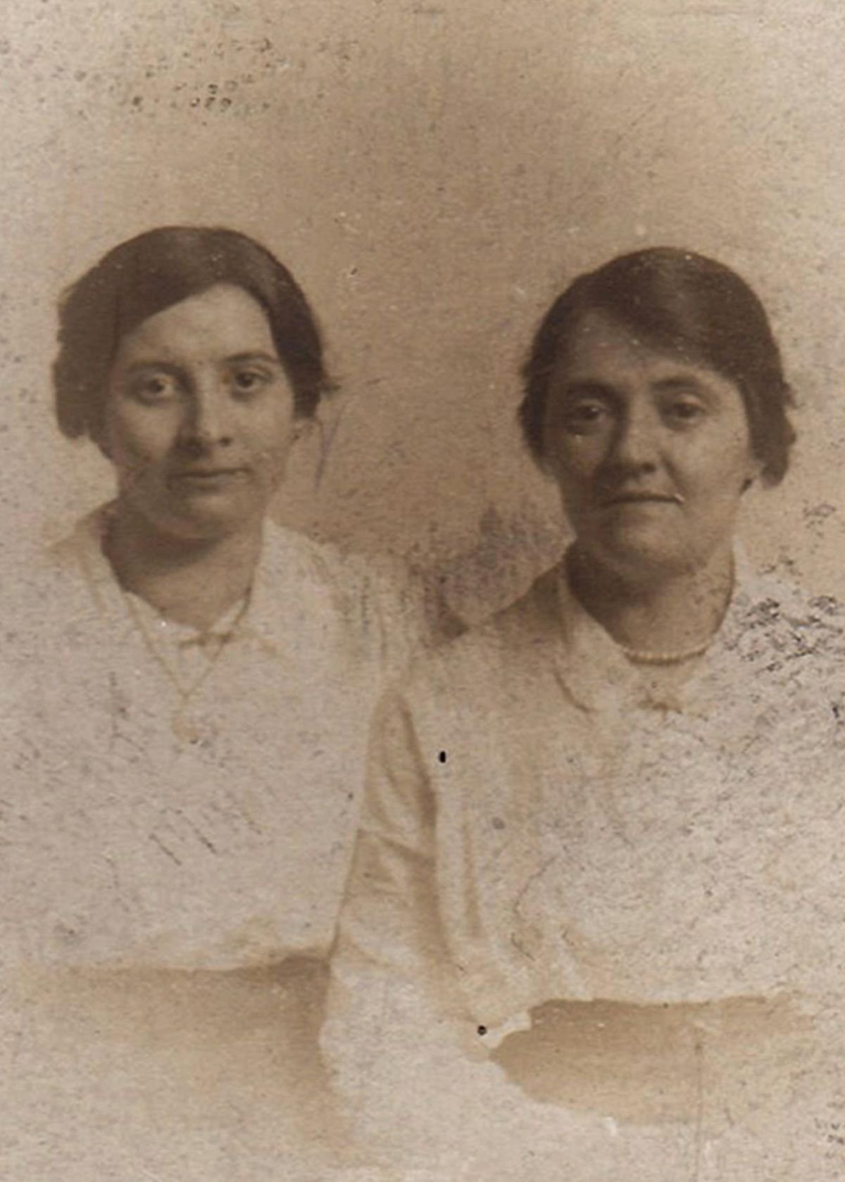 Faded old photograph before restoration