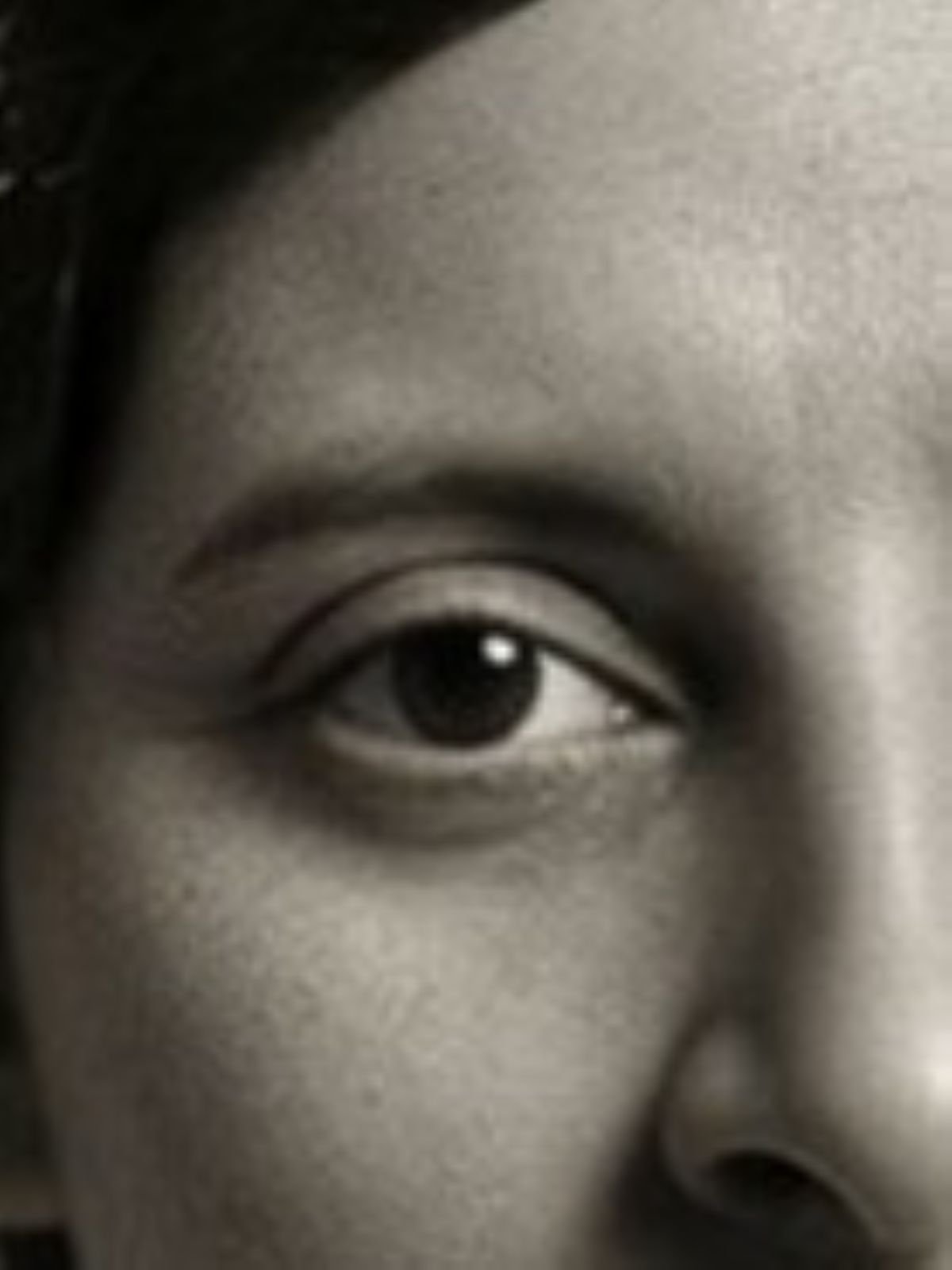 Close-up detail of restored portrait showing repaired facial detail