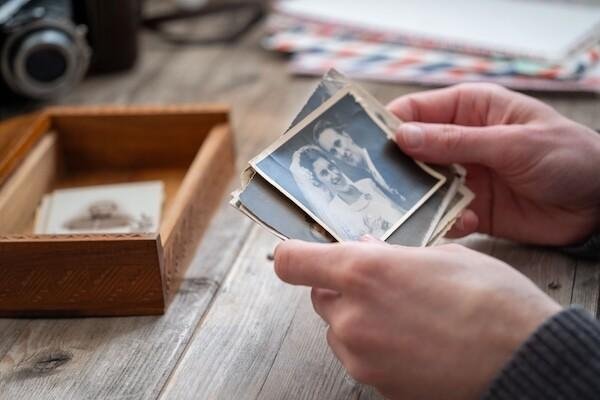 Handling old family photographs carefully