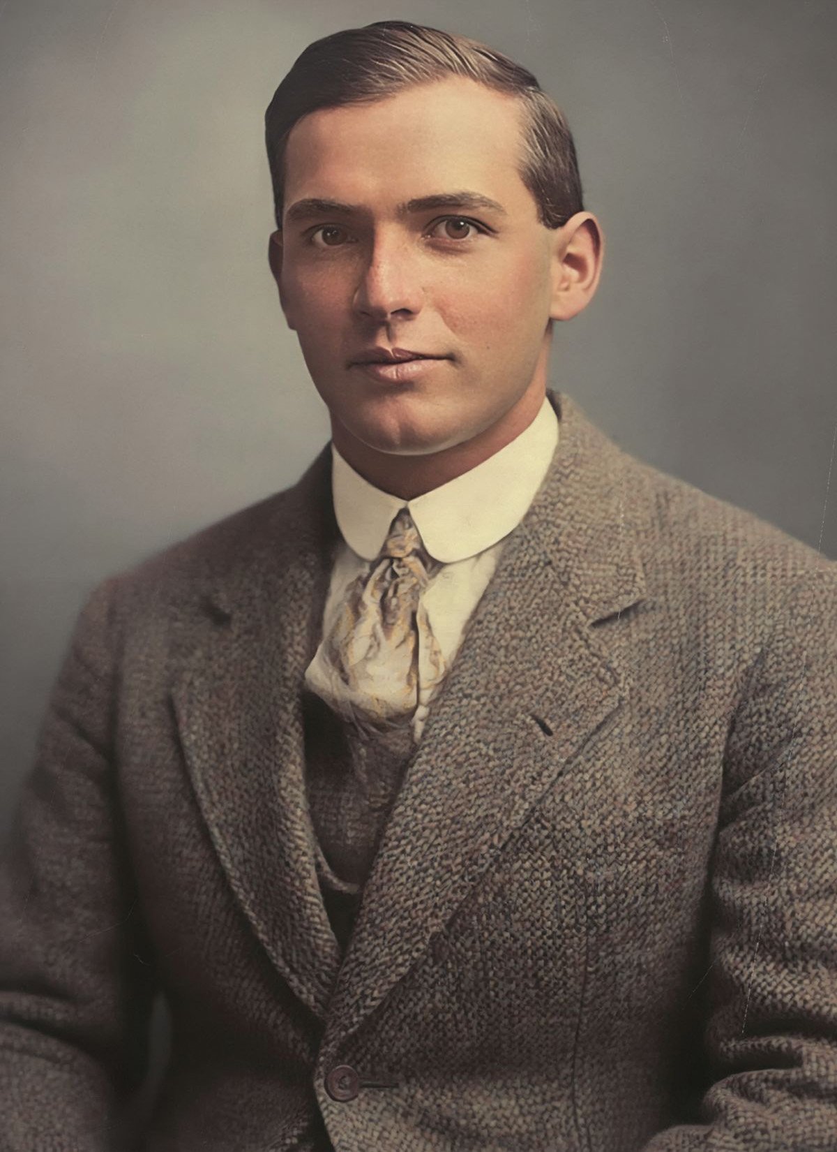 After photo restoration showing a hand-restored portrait with creases repaired